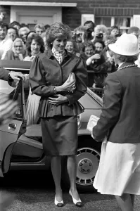 THE PRINCESS OF WALES GETTING OUT OF A CAR DURING VISIT TO NEWCASTLE APRIL 1986