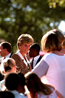 01416 Prints: PRINCESS OF WALES GREETING PEOPLE DURING A VISIT TO RED CROSS CHARITY PROJECT IN ZIMBABWE