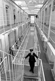 A prison guard on patrol in B wing of Britains top security prison Parkhurst