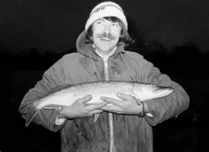 00089 Prints: A prize pike. Trevor Adams poses proudly for the camera after winning the Blemhiem