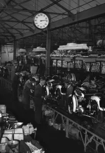 Production line at Triumph Motorcycles factory at Meriden. Circa 1955