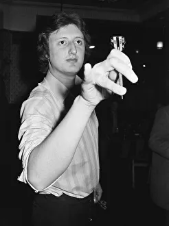 Professional British dart player Eric Bristow in action at the General Picton Public