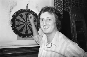 01164 Prints: Professional British dart player Eric Bristow in action at the General Picton Public