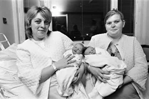 00706 Prints: Two proud mothers with their new born babies that were delivered on Christmas Day