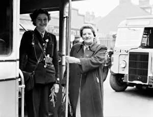 00008 Prints: Public Transport Buses. Woman thanks helpful conductoress with a cheerful goodbye on a