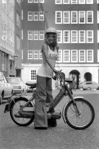 Publicity Dept: Girl on Bicycle. September 1975 75-04942-002