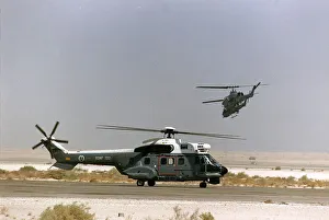 Saudi Arabia Prints: A Puma helicopter awaits clearence for take off from a Saudi airfield located in