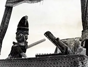 00363 Prints: Punch and Judy - Mr Punch wins the battle again against the crocodile at a party given by