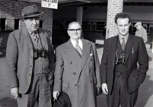 Punters at the races, equipped with binoculars to check form March 1963