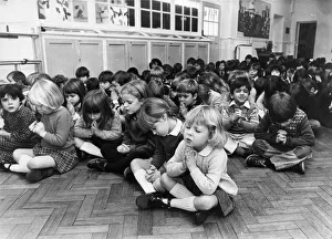Praying Prints: Pupils deep in concentration or just wishing for home time - Prayers during morning