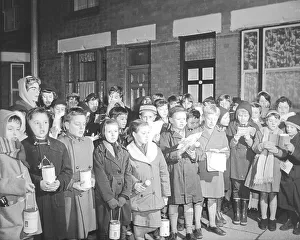 Winter Prints: Pupils from Frederick Bird Junior School, Coventry, singing carols in the Hillfields area