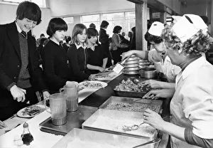 00121 Prints: Pupils at Hirst High School in Ashington queue for their school dinner