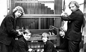 00116 Collection: Some of the pupils of Newcastle Cathedral School re-assembling an organ that was given to