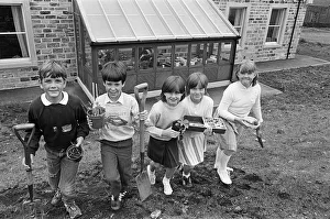 Pupils of Scholes Junior and Infant School ready to plant seedlings grown in the new