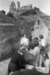 Rural Prints: Pupils sketching Corfe Castle during a school visit to the ruins of the 11th century