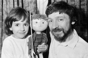 00605 Prints: Puppet on a string... Four-year-old Rosie Smith has found a new friend - Ben