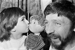 00605 Prints: Puppet on a string... Four-year-old Rosie Smith has found a new friend - Ben