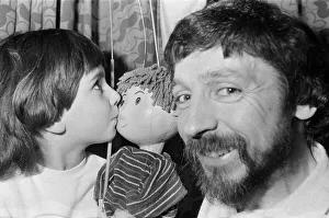 00605 Prints: Puppet on a string... Four-year-old Rosie Smith has found a new friend - Ben