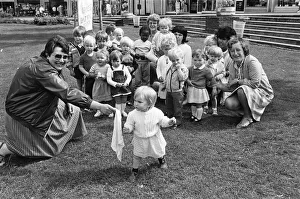 Putting her best foot forward... Little Jessica Meacham, watched by Mrs Elizabeth Bishop