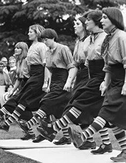 Festival Prints: Putting on the style, with their best feet forward are women clog dancers demonstrating