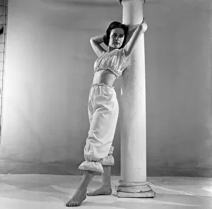 Pillar Prints: Pyjama fashion, two piece pantaloon pyamas with bare midriff. 13th May 1955