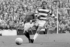 QPR v Manchester United Nobby Stiles chases fater rthe ball during the two