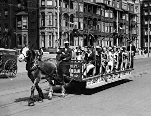 Holidaymakers Prints: The quaint old world. Toast Rack'horse trams are carrying thousands daily