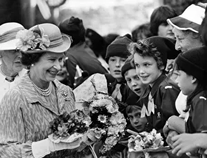 Bouquet Prints: The Queen brings delight to the faces of Brownies who greeted her in Brecon ahead of her