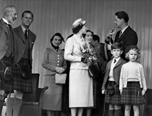 Kilts Prints: The Queen chats with Capt. A. C. Farquharson of Invercauld whilst the Marquess of Aberdeen