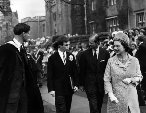 The Queen and Duke visit Rugby School. They took tea with senior boys of the school