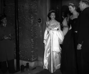 00099 Prints: Queen Elizabeth - 1953 leaves Hutchinson House after the Debs Ball