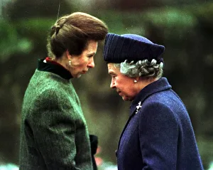 Queen Elizabeth greets local residents and lays a wreath of flowers