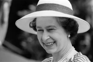 Queen Elizabeth II attends a garden party at Holland House Hostel to mark the Golden
