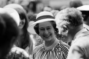 01378 Prints: Queen Elizabeth II attends a garden party at Holland House Hostel to mark the Golden