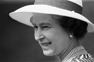Queen Elizabeth II attends a garden party at Holland House Hostel to mark the Golden