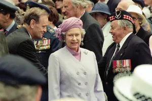 Queen Elizabeth II attends the unveiling of the Canadian War Memorial in Green Park