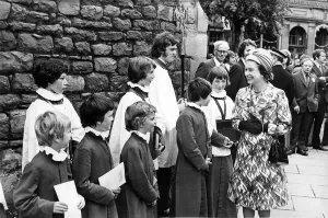 Queen Elizabeth II chats to the choirboys during a visit to Hexham Abbey 1st July