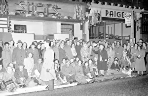 00862 Prints: Queen Elizabeth II Coronation June 1953 People secure their place along the route