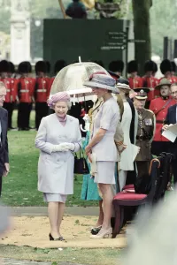 Queen Elizabeth II and Diana, Princess of Wales attend the unveiling of the Canadian War