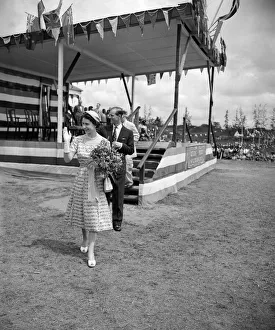 Traditional Prints: Queen Elizabeth II and The Duke of Edinburgh waving to the crowds as they leave