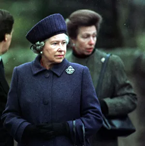 Purple Prints: Queen Elizabeth II greets local residents and lays a wreath of flowers