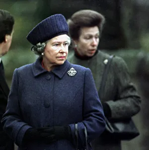 Queen Elizabeth II greets local residents and lays a wreath of flowers