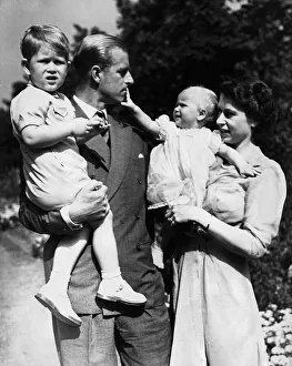 Queen Elizabeth II and her husband Prince Philip with their two children Prince Charles