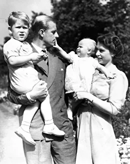 00588 Prints: Queen Elizabeth II and her husband Prince Philip with their two children Prince Charles