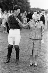 Head Scarf Prints: Queen Elizabeth II, June 1979 The Queen shows Prince Charles the sign at a polo