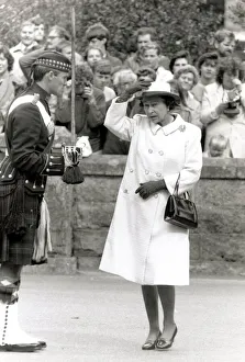 Confusion Prints: Queen Elizabeth II looking scared and gormless Holding hat on head Chatting
