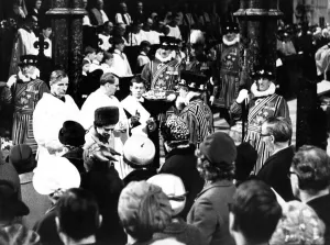 Queen Elizabeth II - the Maundy Money Ceremony at Durham Cathedral - the Queen gives out