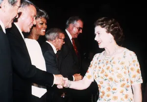 Queen Elizabeth II meeting singer Frank Sinatra at the studios of Twentieth Century Fox
