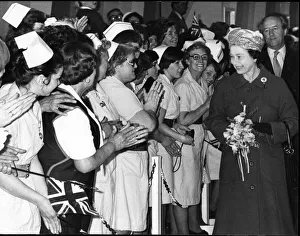 Queen Elizabeth II in Merseyside greeting local nurses, on a walkabout