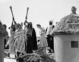Queen Elizabeth II pictured on her tour of Nigeria. Here she is watching